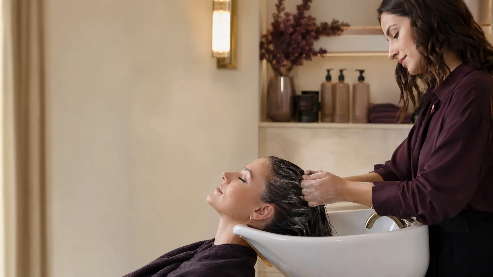 Deep-conditioning hair treatment at a shampoo station